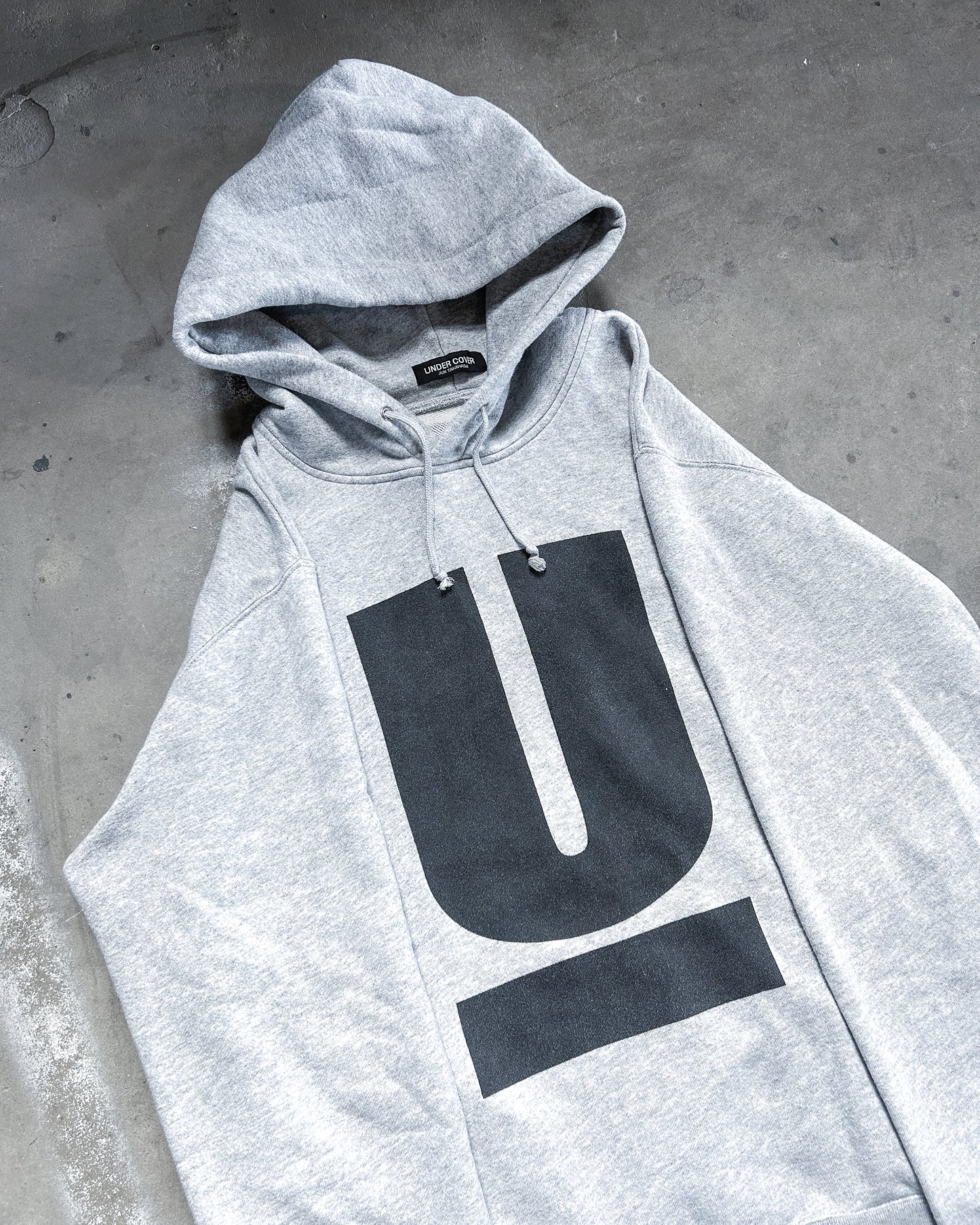 GREY ‘U’ HOODIE