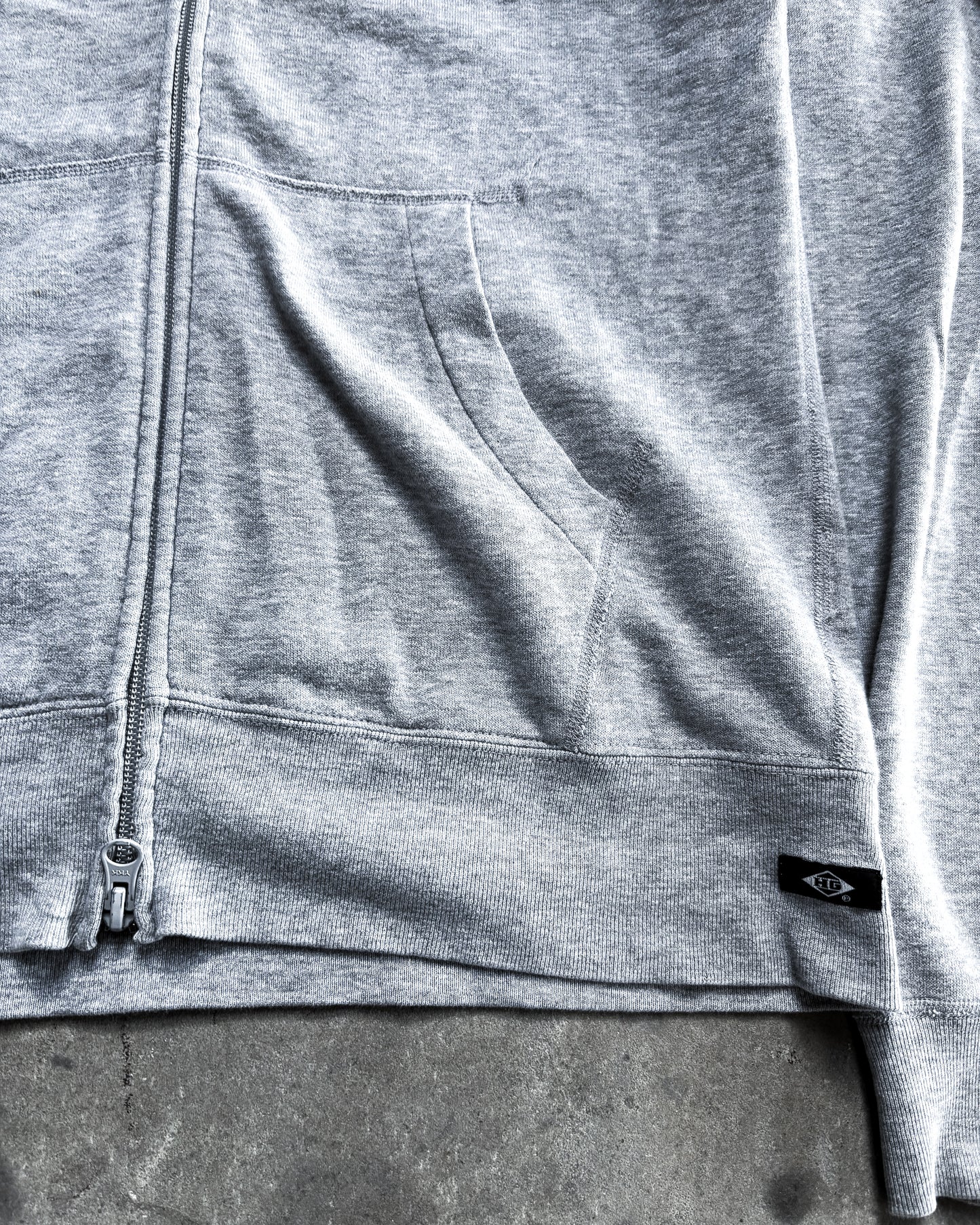 CONTORT YOURSELF ZIP UP
