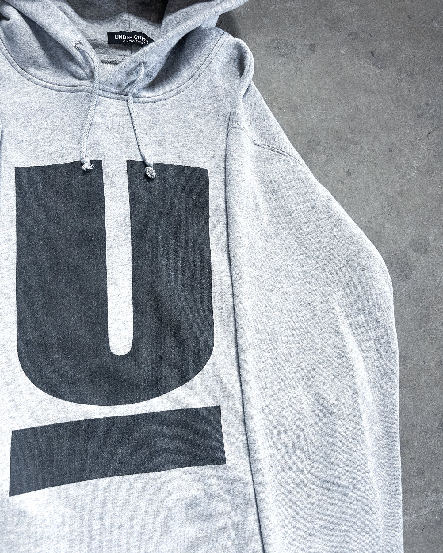 GREY ‘U’ HOODIE