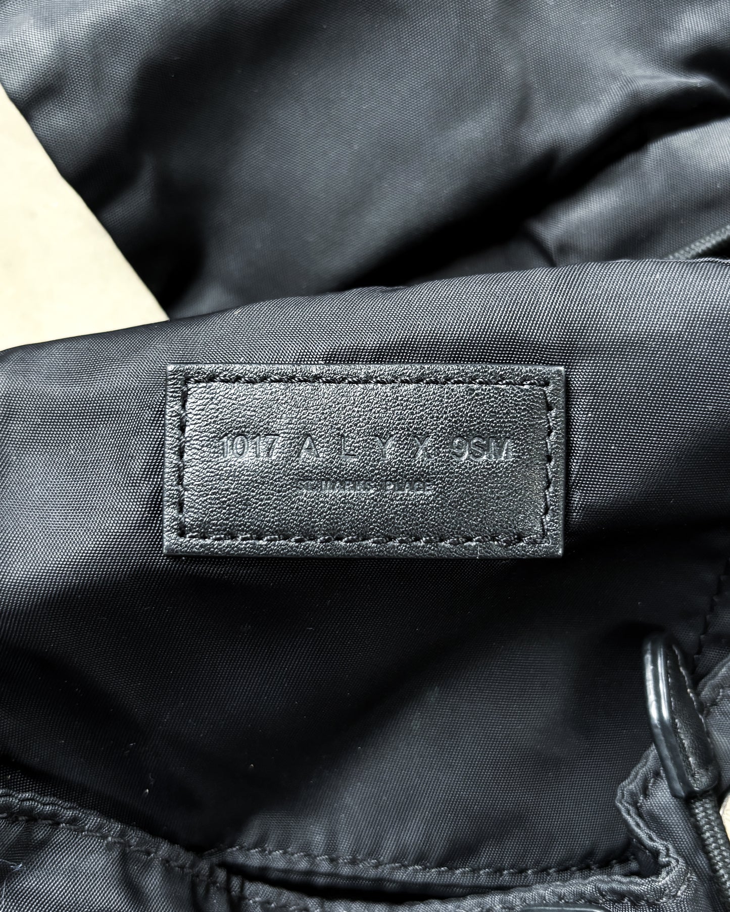 BLACK TANK BUCKLE BACKPACK