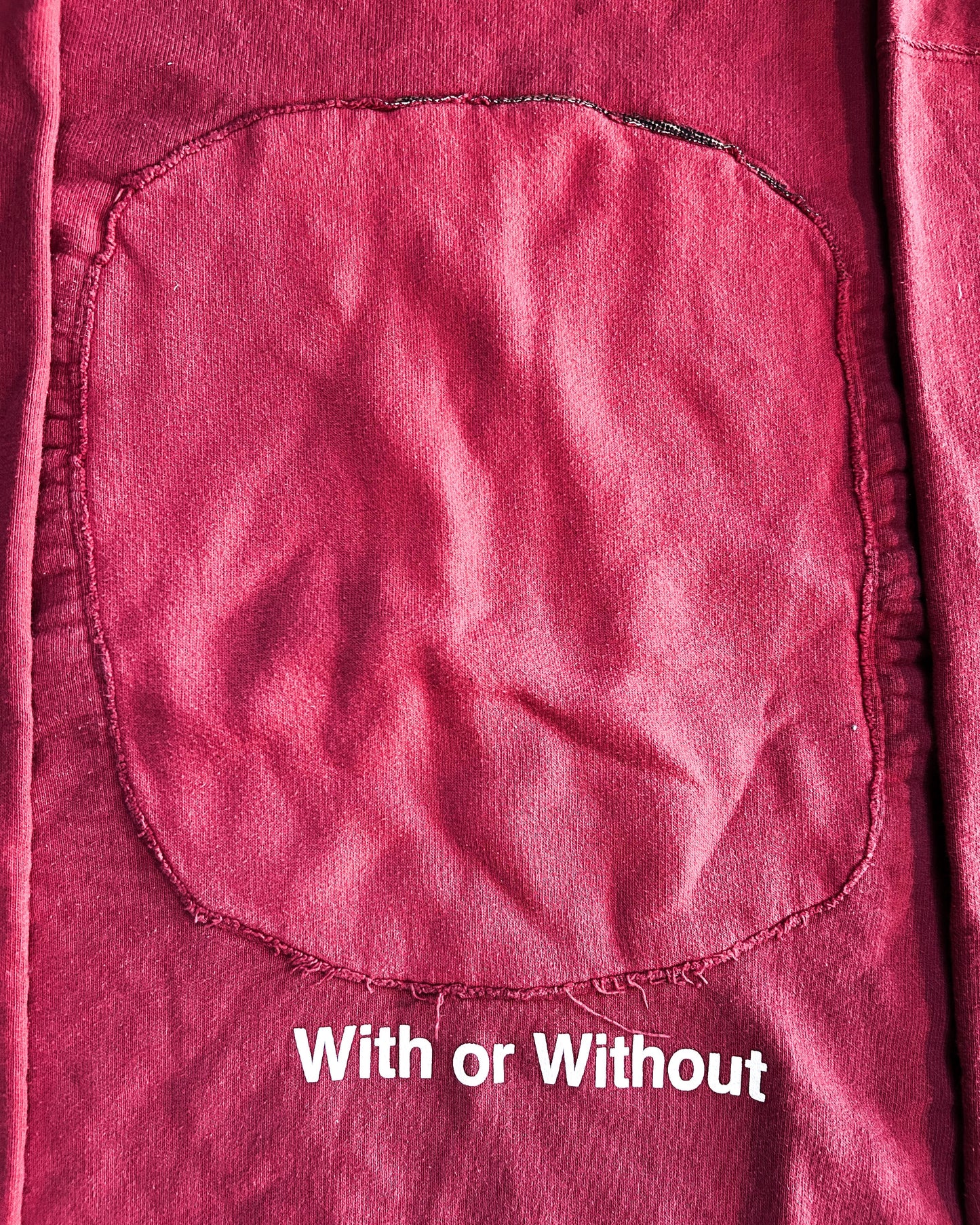 ‘WITH OR WITHOUT’ SWEATER