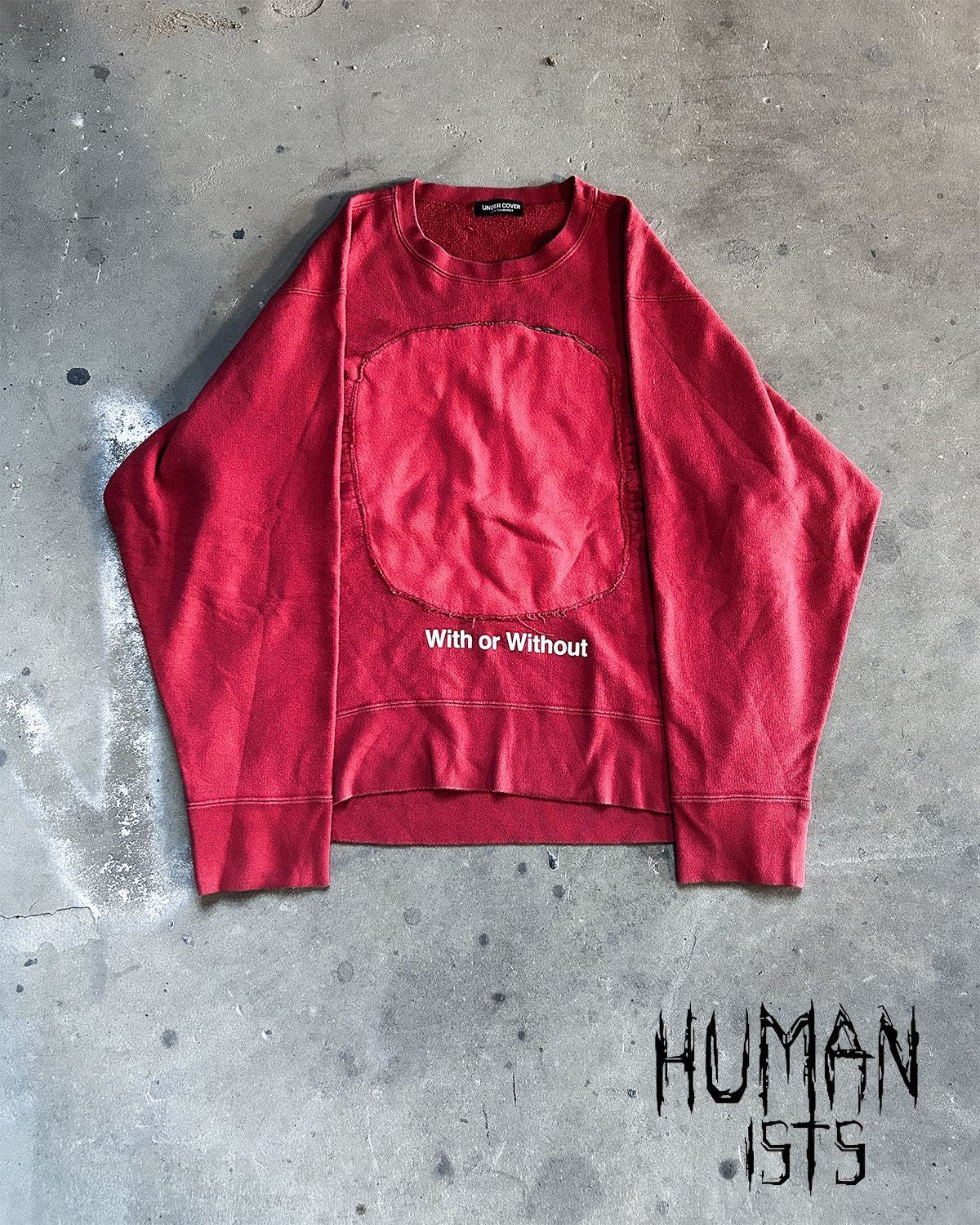 ‘WITH OR WITHOUT’ SWEATER