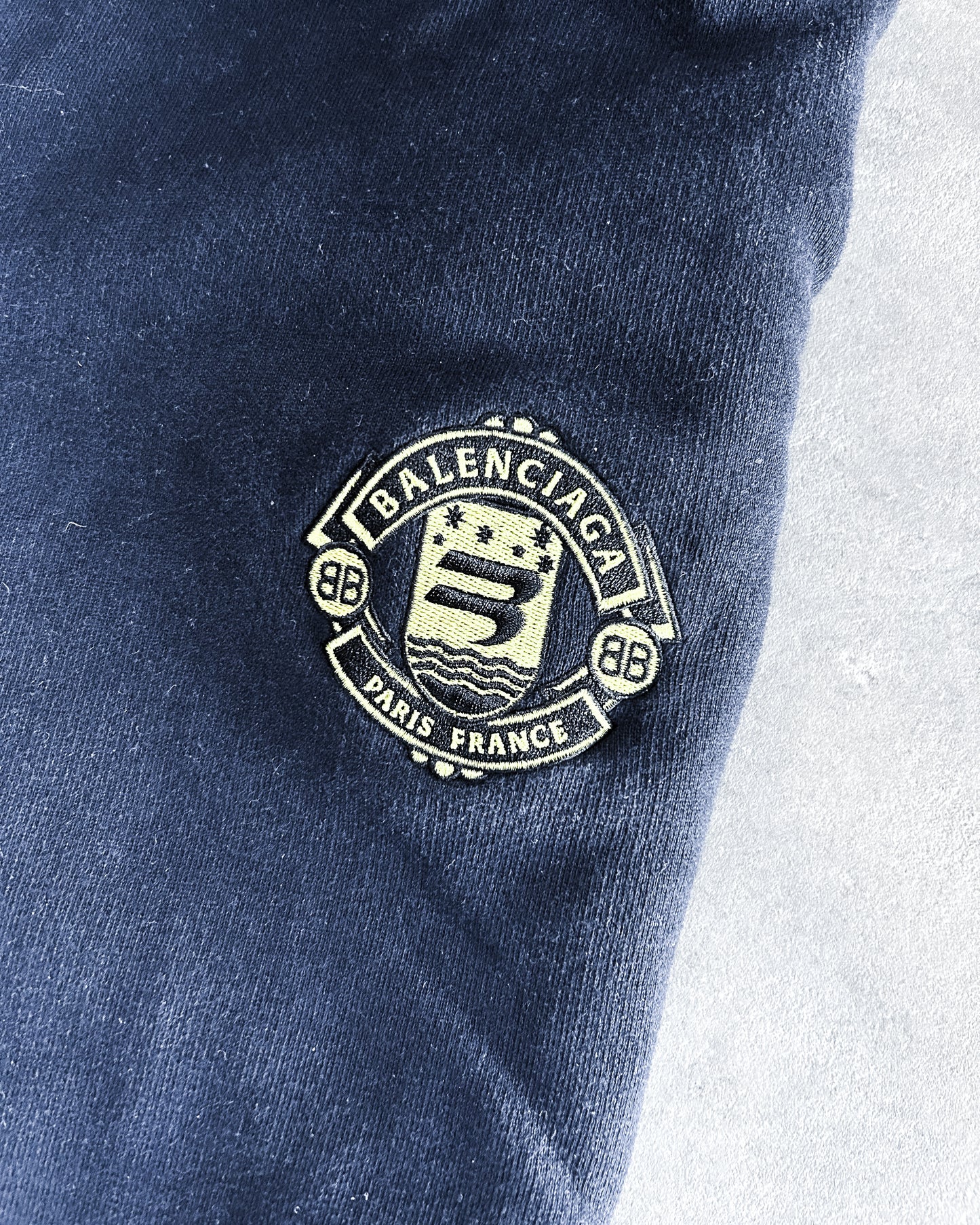 FW21 CREST SWEATPANTS