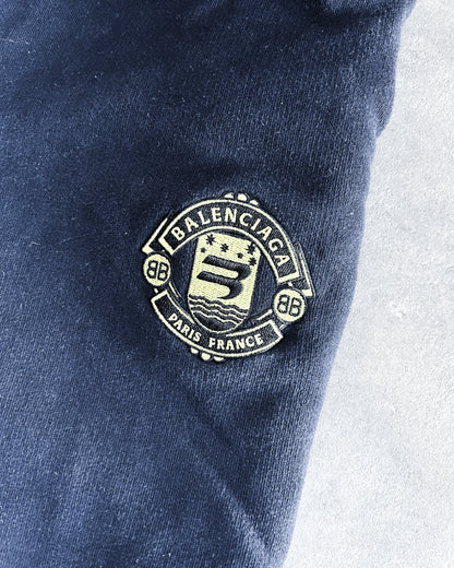 FW21 CREST SWEATPANTS