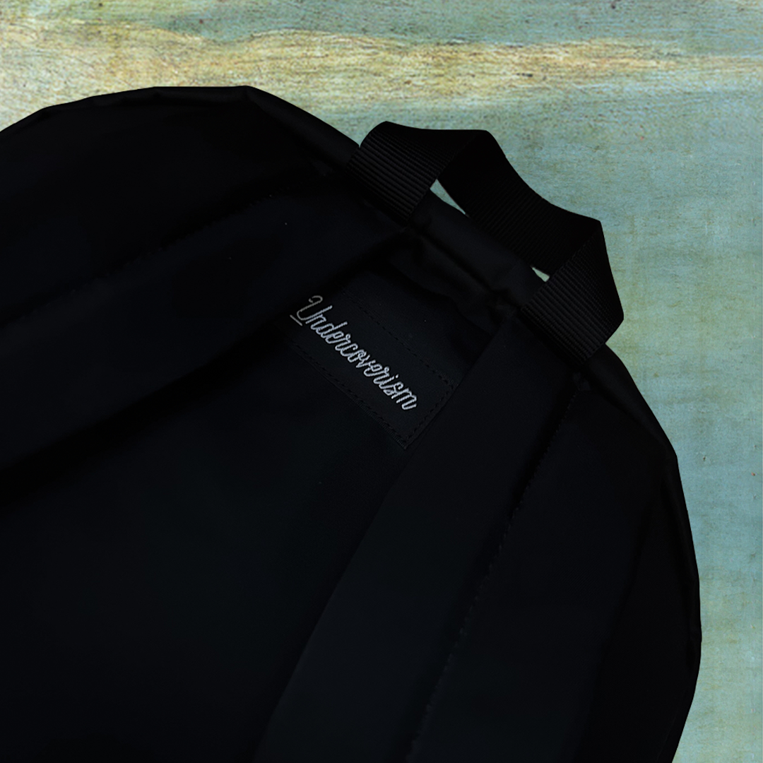 “UNDERCOVERISM” EMBROIDERED LOGO BACKPACK