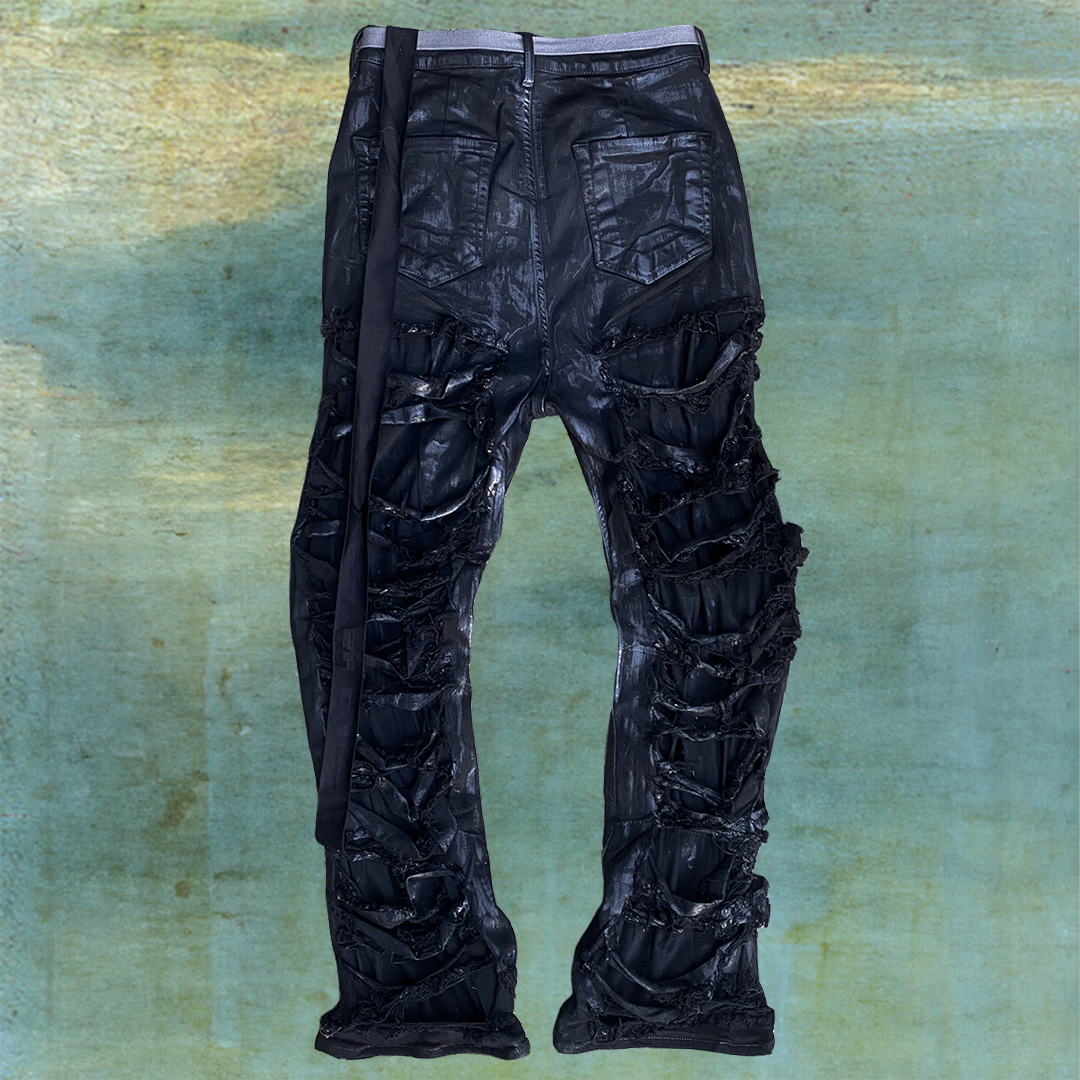 RICK OWENS WAXED SLASHED GETH CUT JEANS